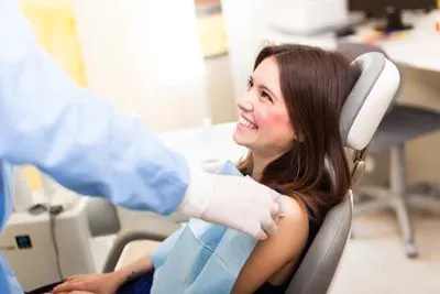 Dr. Danos discussing treatment options with one of his patients